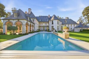 White-brick French chateau estate with pool in Hillsborough, California